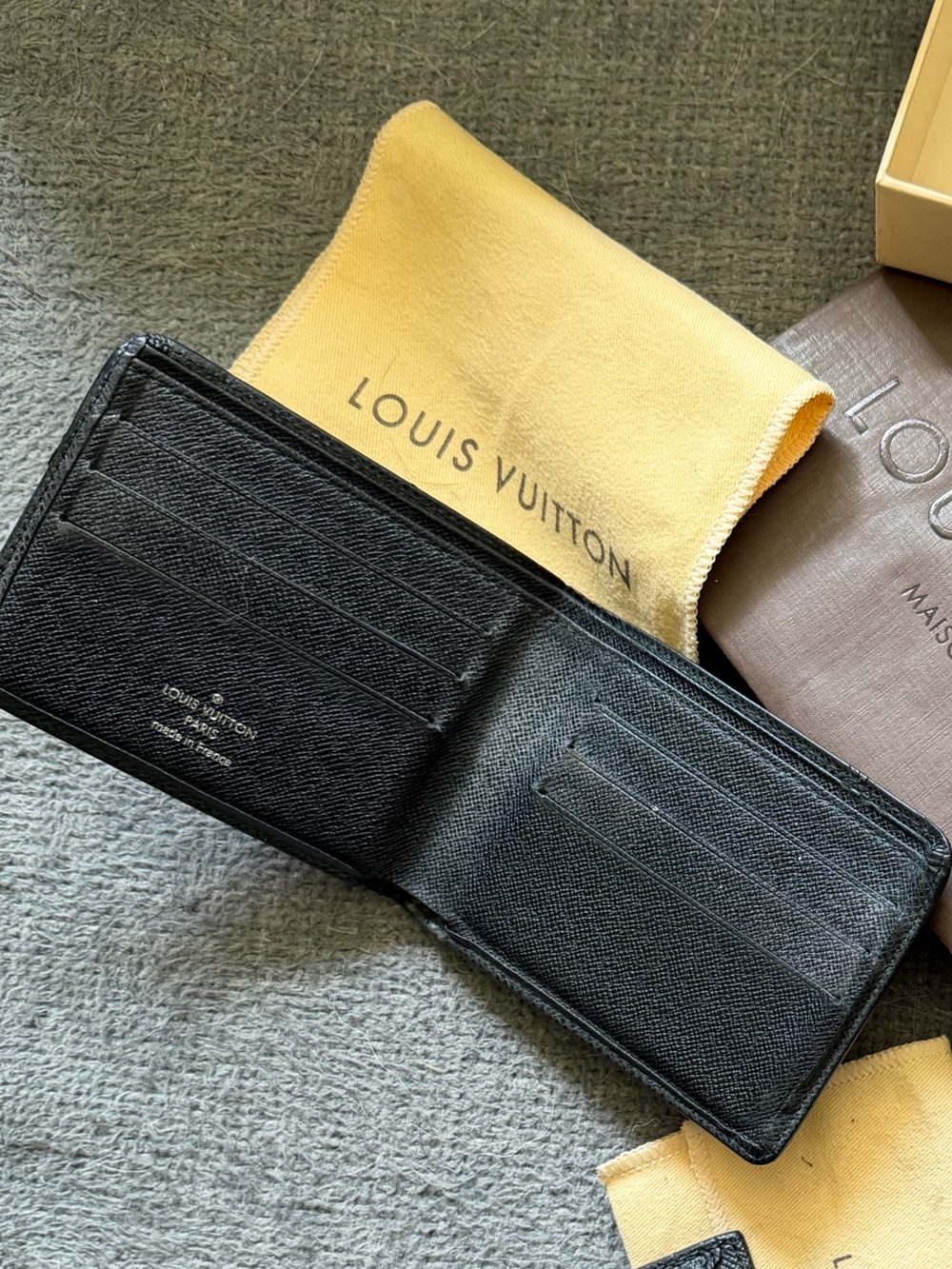 Louis Vuitton Black Textured Leather wallet